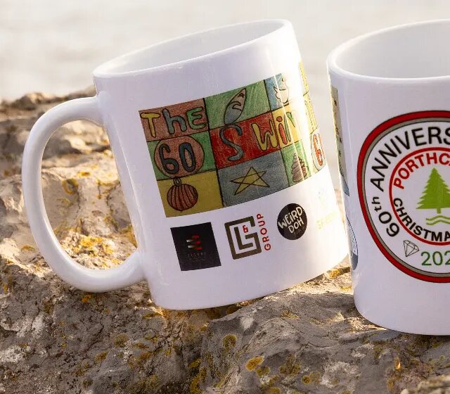 Close-up of sponsor logos printed on last year's commemorative mug